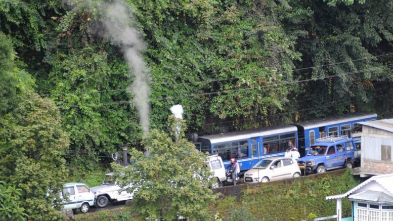 Toy Train caught in a traffic jam in Darjeeling